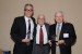 Dr. Nagib Callaos, General Chair, giving special awards to Dr. C. Dale Zinn and Professor Andrés Tremante in Appreciation for their Accomplishments in Mechanical Engineering and their Leadership as Organizing Committee Chairs and Program Committee Co-Chairs of several collocated events  in the IIIS  Conferences.